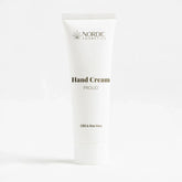 Hvid tube håndcreme fra Nordic Cosmetics med CBD og Aloe Vera