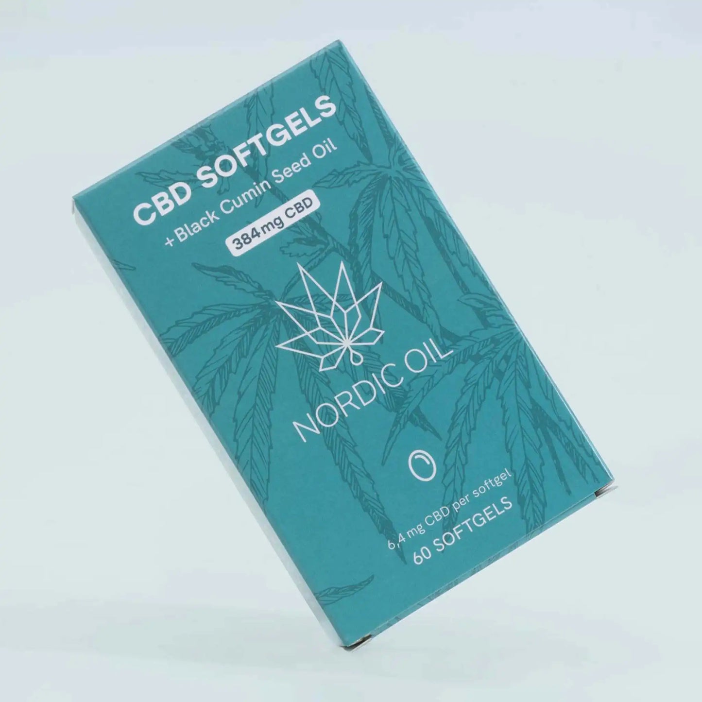 CBD kapselpakke står diagonalt på blå baggrund