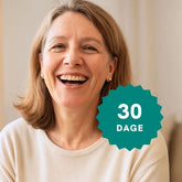 Smilende kvinde med 30-dages badge