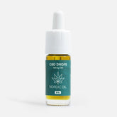 CBD-dråber flaske fra Nordic Oil med grøn etiket og hvid hætte