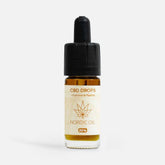 CBD-dråber fra Nordic Oil i en lille glasflaske i brunt glas med dropper og label med 20%