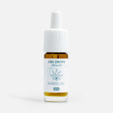 CBD-dråber i amber glasflaske med hvid dropper og Nordic Oil-etiket